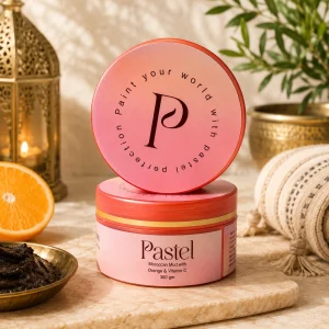 Pastel Moroccan Mud with Orange & Vitamin C displayed on modern geometric white platforms