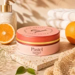 Moroccan Soap with Orange and Vitamin C placed beside fresh oranges and soft towels in a luxury skincare scene